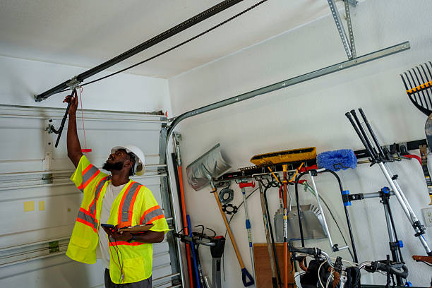 Professional Garage Door Panel Replacement technician working in Wellington, KS