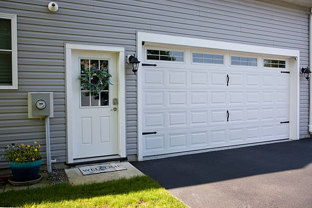 24/7 Emergency Garage Door Panel Replacement experts in Wellington, KS